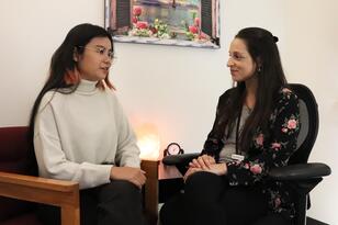 female student talking during counseling session